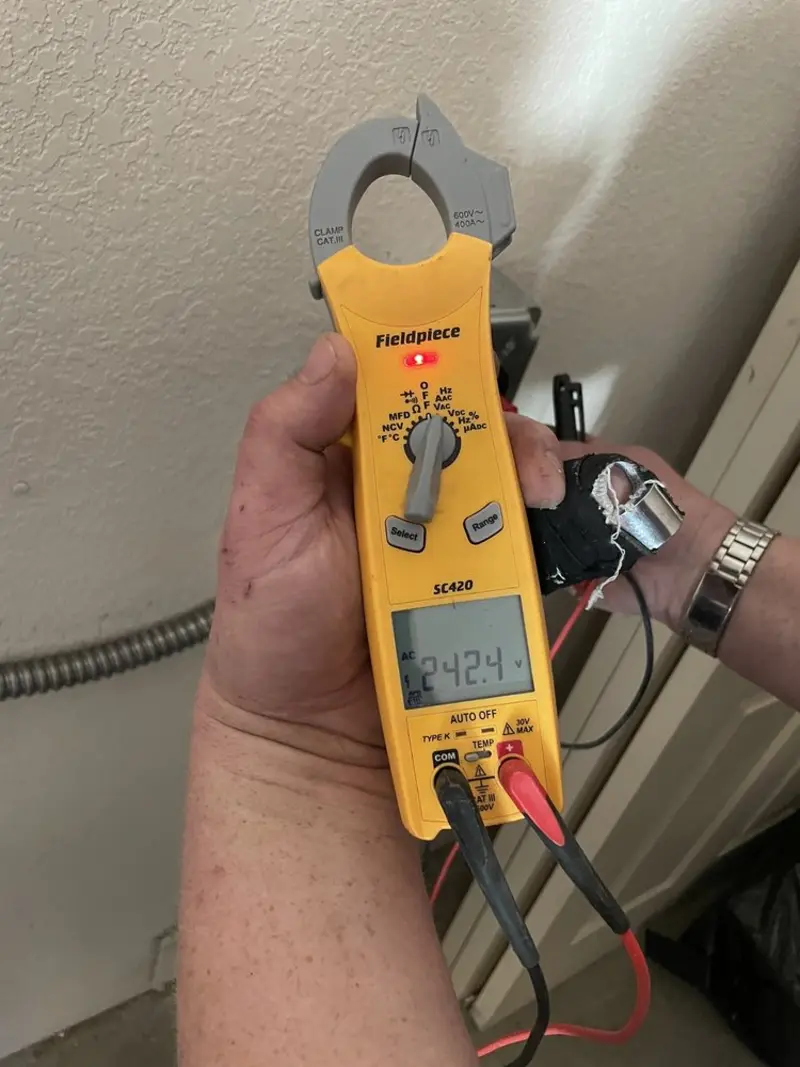 Voltage testing with clamp meter during Hot Tub / Pool Electrical Wiring in Lansing